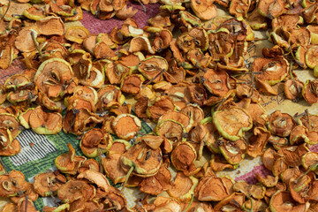 Dried apples. Homemade sun-dried organic apple slices, crispy apple chips.