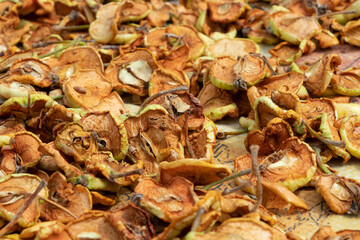 Dried apples. Homemade sun-dried organic apple slices, crispy apple chips.