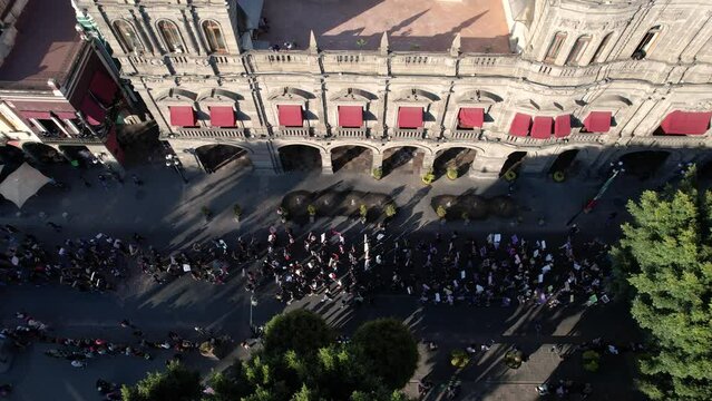 The international women's day march from the air, in the center of Puebla city, Mexico