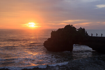 Fototapeta na wymiar Sunset over Pura Tanah Lot, Bali
