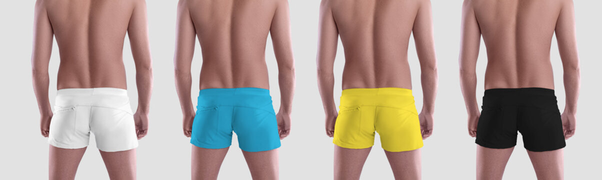 Mockup fashionable white; black, Ukrainian colors trunks, summer panties on guy, isolated on background in studio, back view.