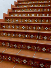 Tiled authentic stair with traditional ornate going up in Bielsa town, Huesca, Spain