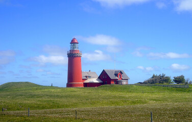 Fototapeta na wymiar famous Bovbjerg Fyr, lighthouse on the North Sea coast of Denmark, danish landmark, travel, tourism, attraction