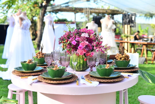 table set with flowers and pitombas regional fruits, bridal fair, ornamental flowers