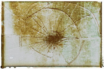 Vintage photo with film grain and frame wit wet plate technique - Broken glass with cracks on black background