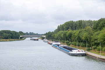 Naklejka premium Inland vessel moored to a canal