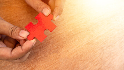 Hand hold jigsaw. concept of missing a key success