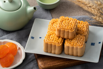 Delicious mung bean moon cake for Mid-Autumn Festival food mooncake on gray table background.