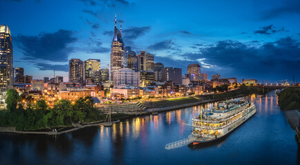 Nashville skyline with river and sunset
