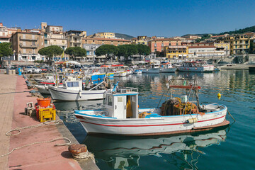 Colorful fishing boats moored at Marina di Camerota port, Campania region, Italy