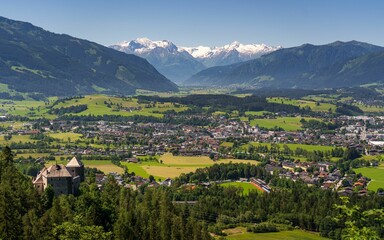 Aerial drone shot of the Saalfelden town at the foot of the mountains in Austria