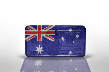 national flag of australia on the dollar money banknote on the white background .