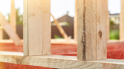 Unprocessed wooden plank at ecological construction site