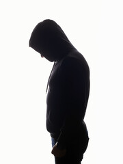 Man in Hood. Boy in a hoodie. Male silhouette