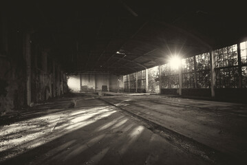 	
Old abandoned factory building or warehouse on sunny summer day