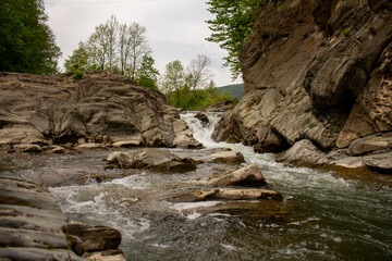Fototapeta premium Waterfall on a mountain river in Sheshory