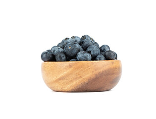 Bowl full of ripe blueberries or bog whortleberry on a white background.
