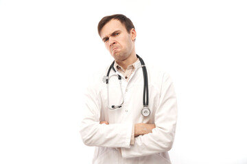 Portrait of angry doctor in white medical coat with stethoscope upset face screaming on white background with copy space