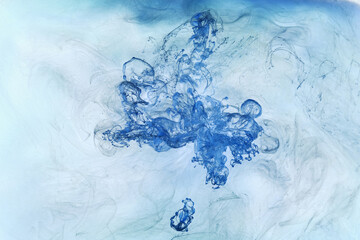 Liquid fluid art abstract background. Blue acrylic paint underwater, galactic smoke ocean