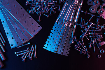 Set of bolts nuts nails metal fasteners. Consumable hardware tools. assortment steel screws collection close up background