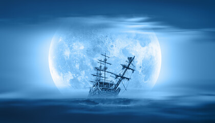 Sailing old ship in storm sea at sunset - Night sky with moon in the clouds 