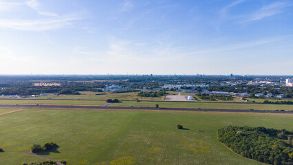 Aerial view from plane landing. Runway of former airport in Neubiberg, south Germany seen from above