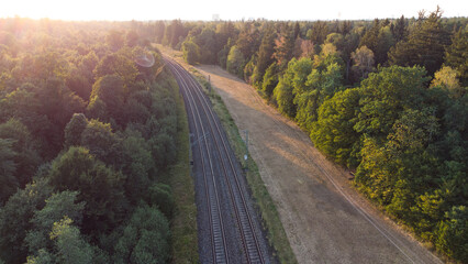 Train tracks through German forest near Munich aerial drone view fotage