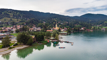 Fototapeta premium Typical Bavarian town in a colorful evening seen from drone view