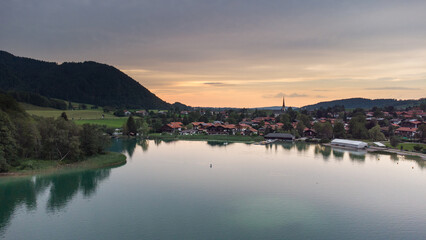 Fototapeta na wymiar Evening aerial view of lake in the Alps. Schliersee in south Germany 