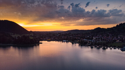 Obraz premium Typical Bavarian town in a colorful evening seen from drone view