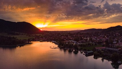 Typical Bavarian town in a colorful evening seen from drone view