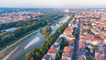 Isar river flowing through the city of Munich in a calm summer morning aerial image - obrazy, fototapety, plakaty