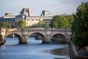 Scenery of the new bridge over the Seine River in the French city of Paris. Paris is divided by the Seine River and this beautiful European city is full of beautiful bridges among other monuments.