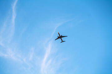 Low angle view of airplane against the sky with space for text. High-quality photo