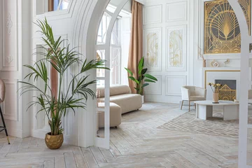 Fotobehang Hotel chique snow-white luxury apartment interior with Egyptian-style decor with light stylish furniture. huge panoramic windows and an archway. minimalism and simplicity with the elegance of modern housing design  © 4595886