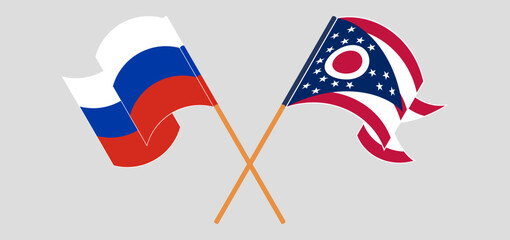 Crossed and waving flags of Russia and the State of Ohio