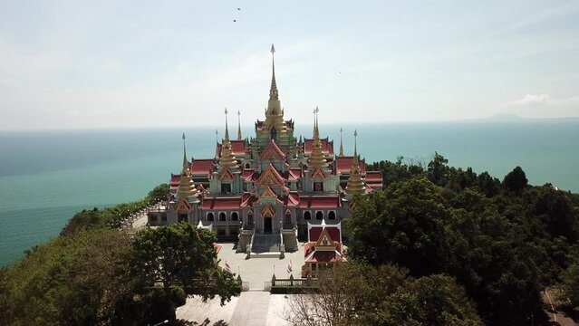 Aerial footage of Wat Thang Sai located along the Ban Krut sea in Prachuap Khiri Khan, Thailand