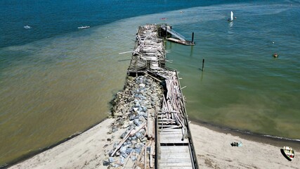 High-angle view of old broken Jericho pier on the seashore