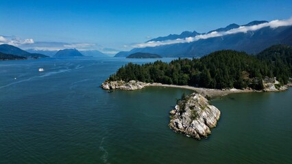 Aerial view of coasts and islands of the sea under the blue sky