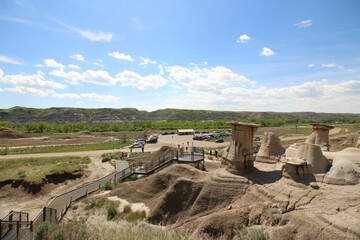 Scenic view of the Hoodoos (the Badlands) under the bright sky, Alberta, Canada