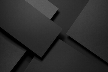 Dark graphite grey abstract textured geometric stepped background with fly rectangle paper sheets,...