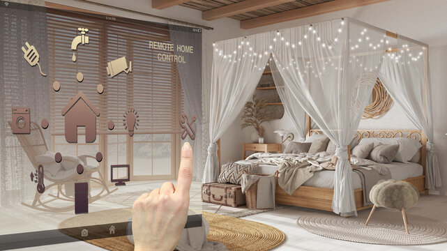 Smart home control concept, hand controlling digital interface from mobile app. Background showing bohemian bedroom with canopy bed in boho style. Country architecture interior design