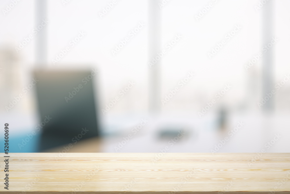 Poster empty wooden office table with light sunny workplace with computer on background, mock up