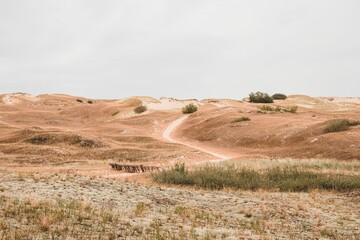 Landscape of Vecekrug Dune, Nida, Lithuania on a gloomy day - obrazy, fototapety, plakaty