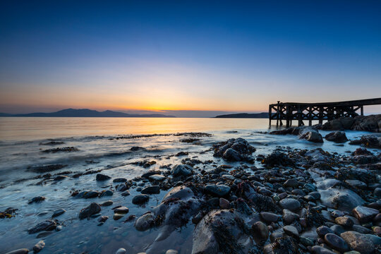 Portencross Beach and pier, Isle of Arran in background, Firth of Clyde, North Ayrshire, Scotland, United Kingdom