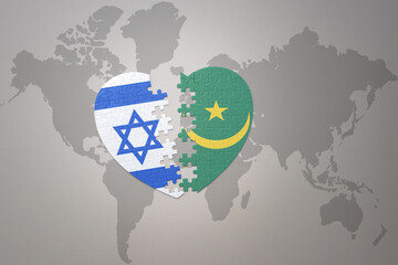 puzzle heart with the national flag of mauritania and israel on a world map background.Concept.