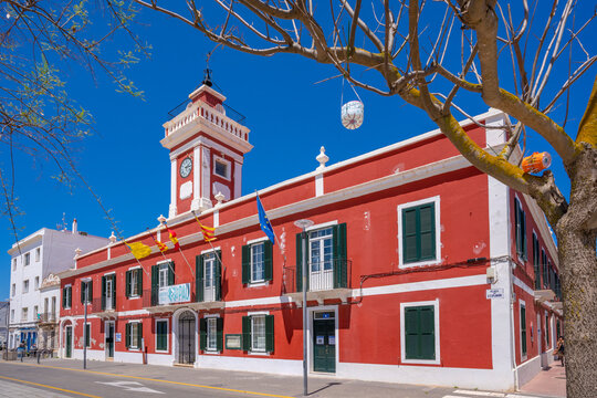View of colourful archiecture in Placa de S'Esplanada against blue sky, Cales Fonts, Menorca, Balearic Islands, Spain
