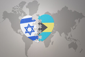 puzzle heart with the national flag of bahamas and israel on a world map background.Concept.