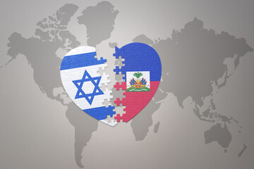 puzzle heart with the national flag of haiti and israel on a world map background.Concept.