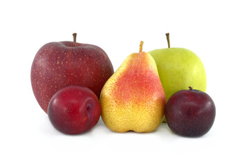 Pear, plums and apples isolated on white